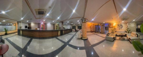 AA Hotel and Suites
